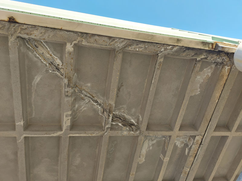 Pre-existing concrete cracking on conveyor gantry slabs inspected following seismic events.